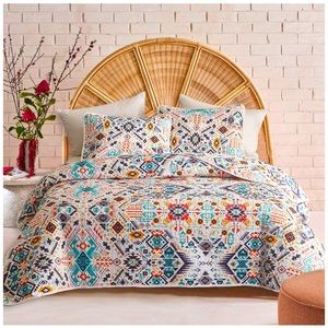 geometric print quilt and shams